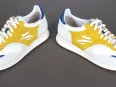 Vue 1 – chaussures jaunes